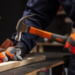 side-view-worker-using-hammer.jpg